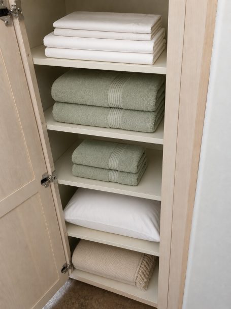 Linen Closet with Essentials Only Home Organization: Getting Rent Ready